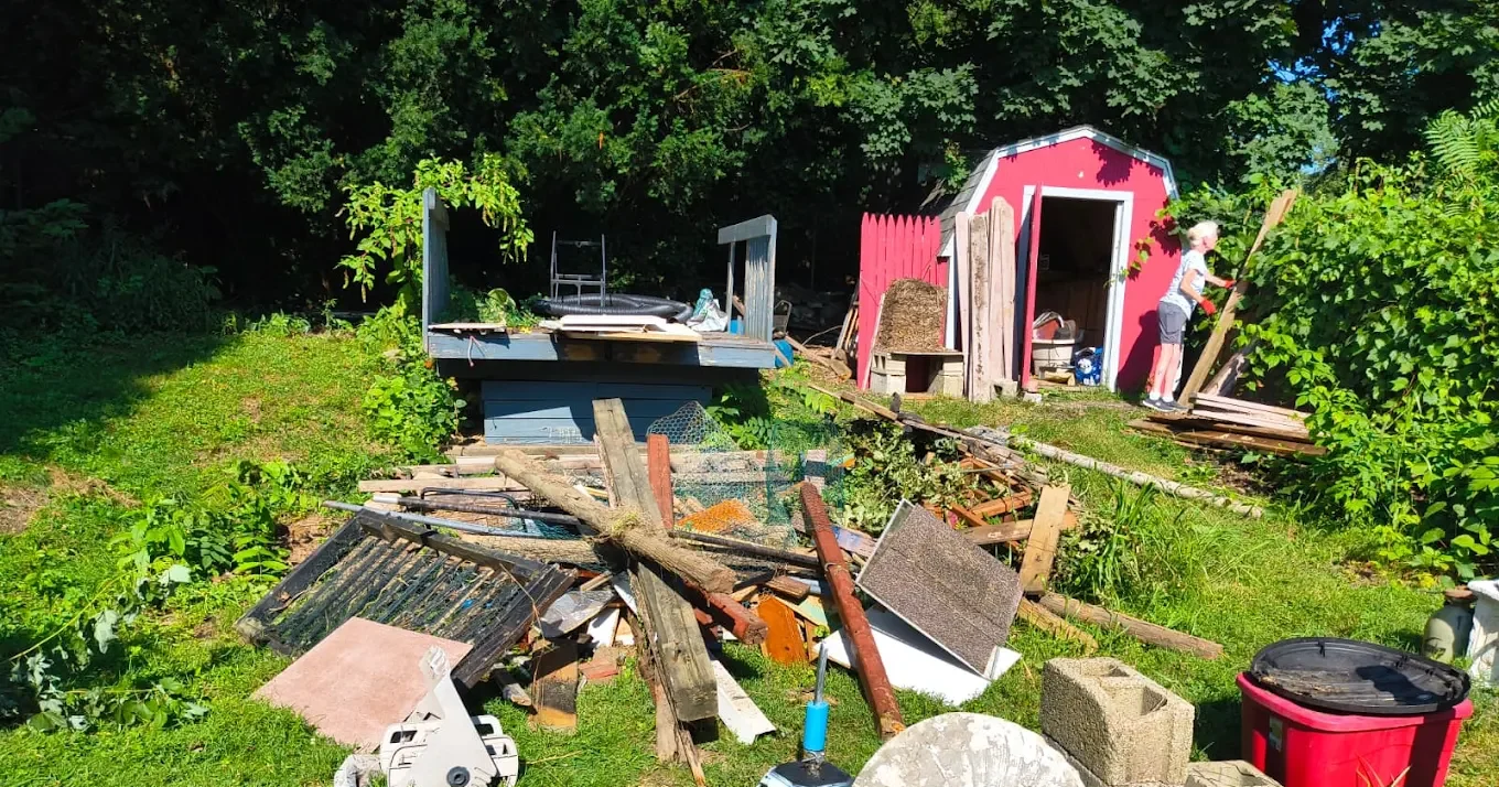 Heavy branches being loaded into truck